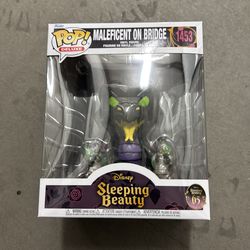 Funko pop maleficent on bridge
