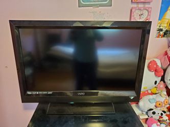 Vizio 32' TV and computer desk is length 26inches, depth 18inches, height 29inches, pull out key board tray.