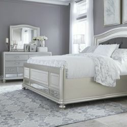 Coralayne Silver Upholstered Panel Bedroom Set

