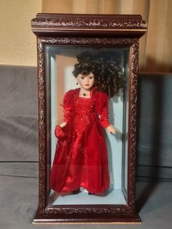 Porcelain Doll in Glass Display Case