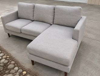 L-shaped reversible sectional *could deliver