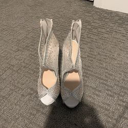 Silver mesh heels with rhinestones throughout with back zip