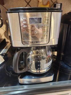 Mr. Coffee machine with pot, working