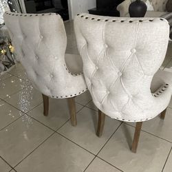 2 BEIGE DINNING CHAIRS PICK UP TODAY 