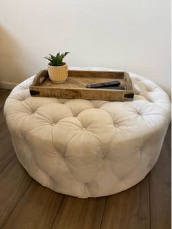 Grey tufted ottoman