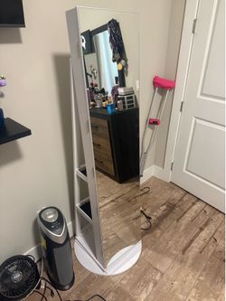 White rotating jewelry mirror Armoire with full-length mirror