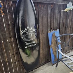 Old Surfboard Used For Decor