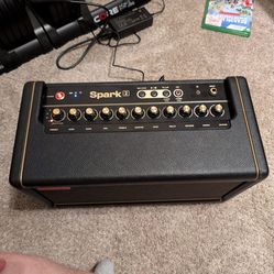 Complete electric guitar setup (guitar, amp, pedal, headphones)