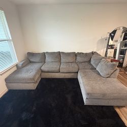 Gray U shaped sectional couch