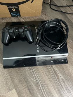 Sony Playstation 3 w/ cords & controller