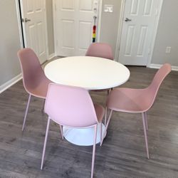 Round Dining table 32 inches , with 4 pink chair … 