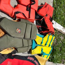 stearns life vest and other life jackets and wetsuit 