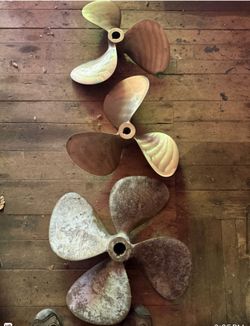 Three Bronze Inboard Boat Propellers