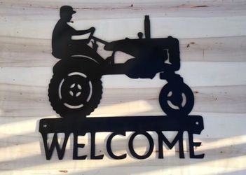 Large metal "Welcome" sign