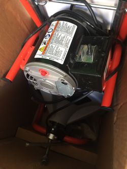 Powered drain cleaner