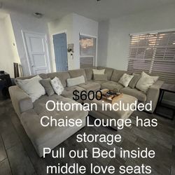 Tan Sectional With Ottoman