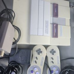 Super  Nintendo 2 Remote Controls  in Power Cord in NTENA  CABLE GOOD CONDITION