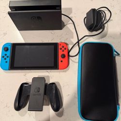 Nintendo switch docking station charger  extra controller, HDMI cord  and games