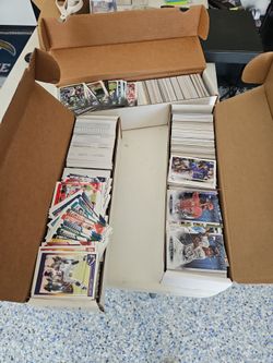 3 full boxes  of sport cards .