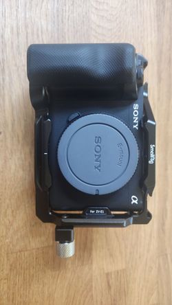 Like new Sony ZV-E1 camera, cage and collapsible  viewfinder