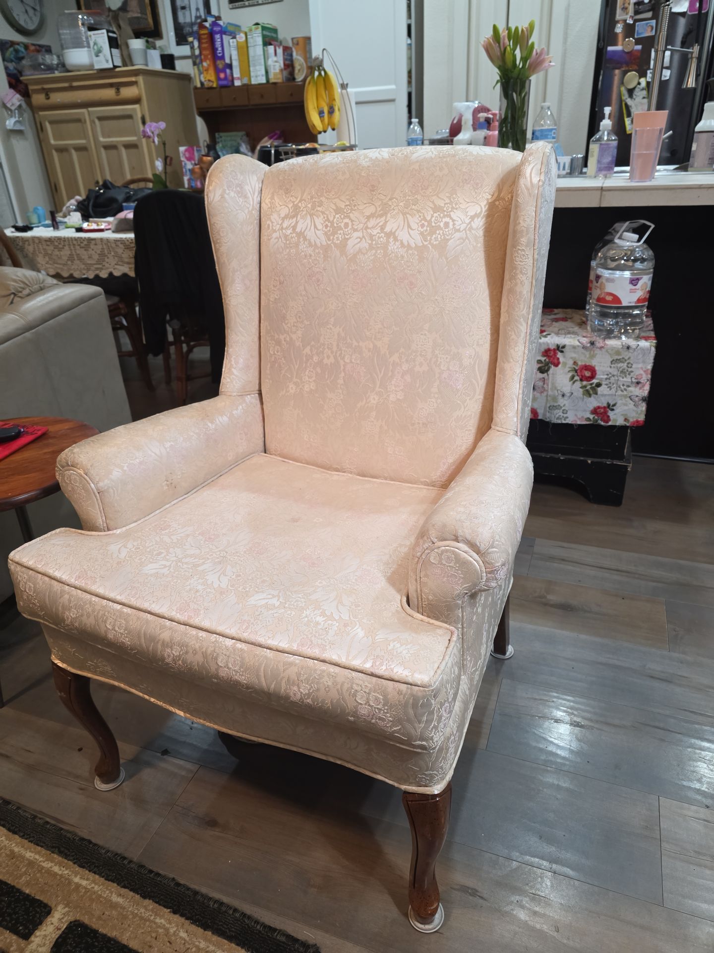 Ivory colored brocade oversized arm chair