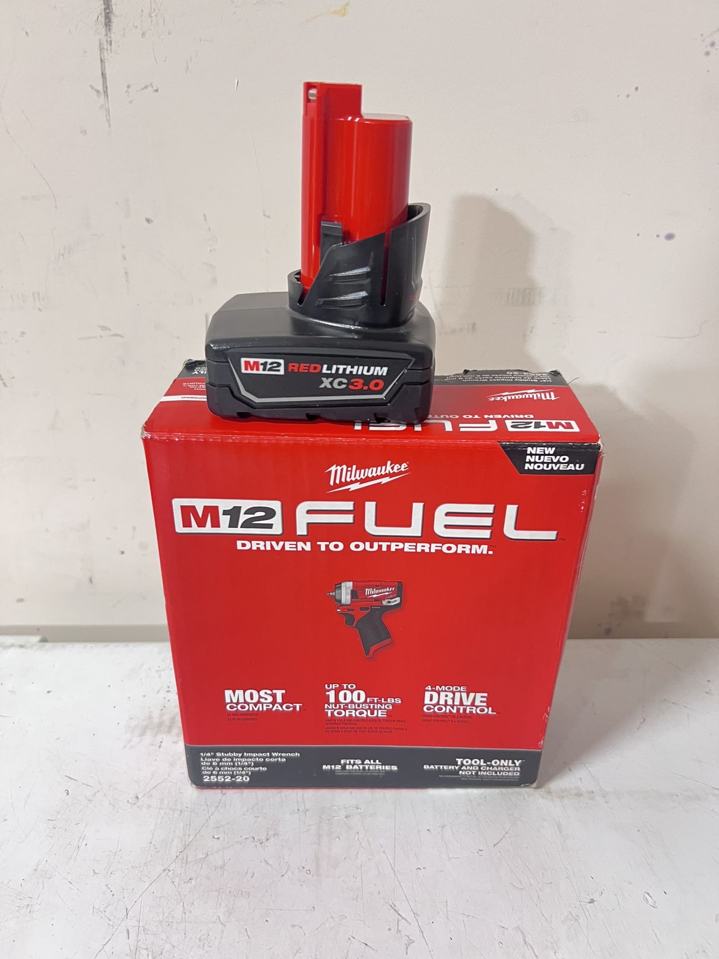 Milwaukee M12 FUEL 12V Brushless Cordless Stubby 1/4 in. Impact Wrench with a 3.0 battery