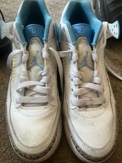 Blue and white Jordan 3 spikes size 6.5 kids