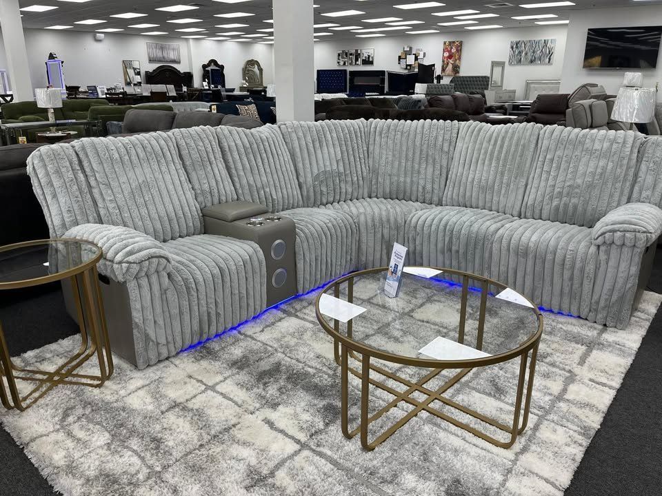 Brand New Gray plush fabric 3 Pc Power reclining Sectional w/speaker & console
