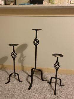 Three candleholder to put by the fireplace.