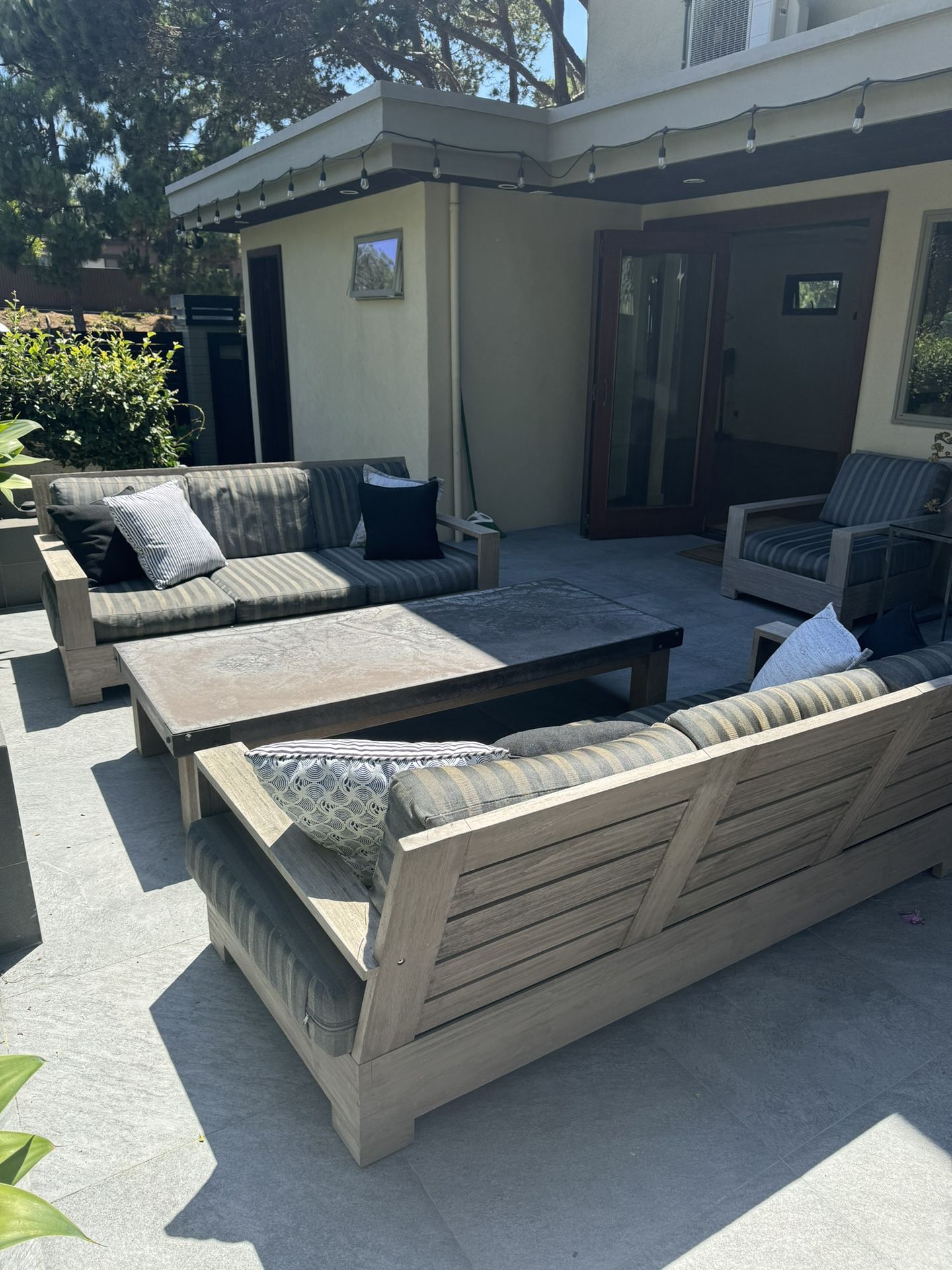 2 Restoration Hardware outdoor French Teak Sofas and 2 matching chairs. Plus Matching Concrete and Teak Coffee Table MAKE AN OFFER!
