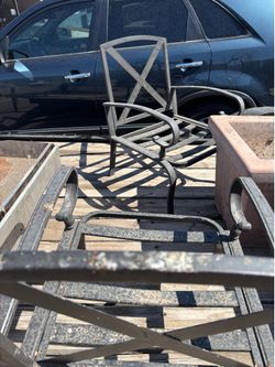 Two Metal Patio Chairs