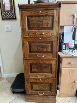 Oak 4 door file cabinet