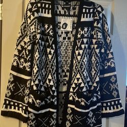 New with tag cardigan sweater size large with two pockets!!