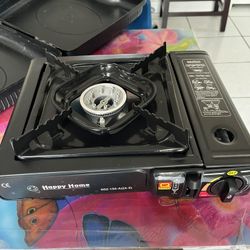 New gas stove with its camping manual, very easy to transport. See photos. Measures 13x10 inches.