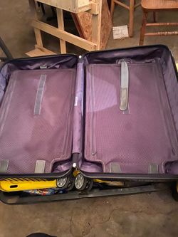 The RIMOWA Essential Cabin Spinner Suitcase