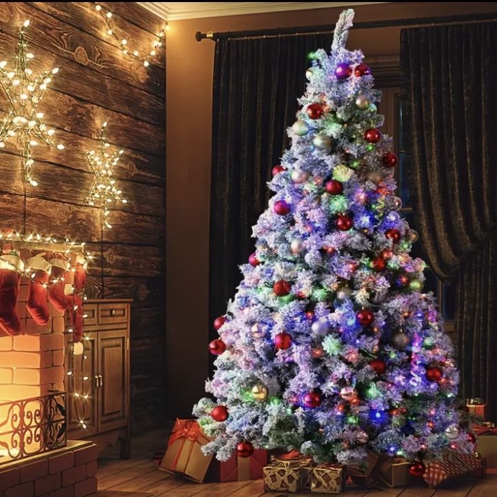 Brand new In Box Brand new in box 6.5ft Prelit Snow Flocked Artificial Christmas Tree with 250 Warm White