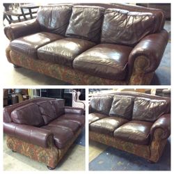 Genuine leather couch with paisley base and brass studs