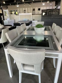Large Dining Set features contemporary rhinestone frame in bright White lacquer