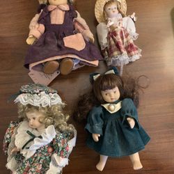 Lot Of 4 Porcelain Dolls
