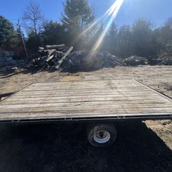 ATV open trailer with slide under ramps