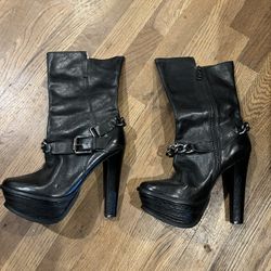 Boots - Black 6 inch high heels with zips, size 10 with chains. 