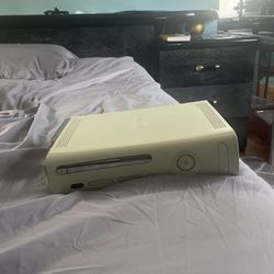 Xbox 360 (with Controllers and WiFi extender)