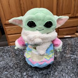 STAR WARS Grogu The Child Plush Baby Yoda MANDALORIAN Wearing an Easter Egg Robe.  Size approximately 8 inches tall.  Brand new with tags.