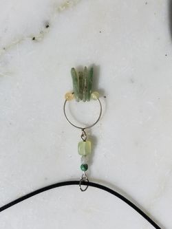 Prehnite sticks with mixed green gemstones