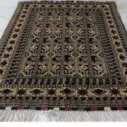 For sale: Three handwoven rugs made from Afghan wool.