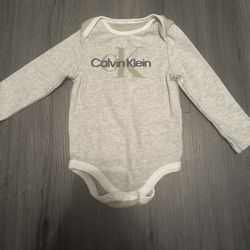 baby calvin klein long sleeve onesie 6-9 months 