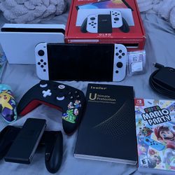 NINTENDO SWITCH OLED MEGA BUNDLE!