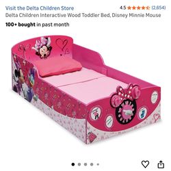 Delta Children Minnie Mouse Toddler Bed  Interactive Minnie Mouse toddler bed in good condition. Perfect for a toddler transitioning from a crib. No m