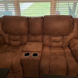 Loveseat-Electric Recliner and Console. 
