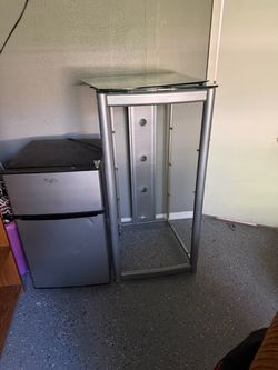 Silver Metal and Glass Display Stand